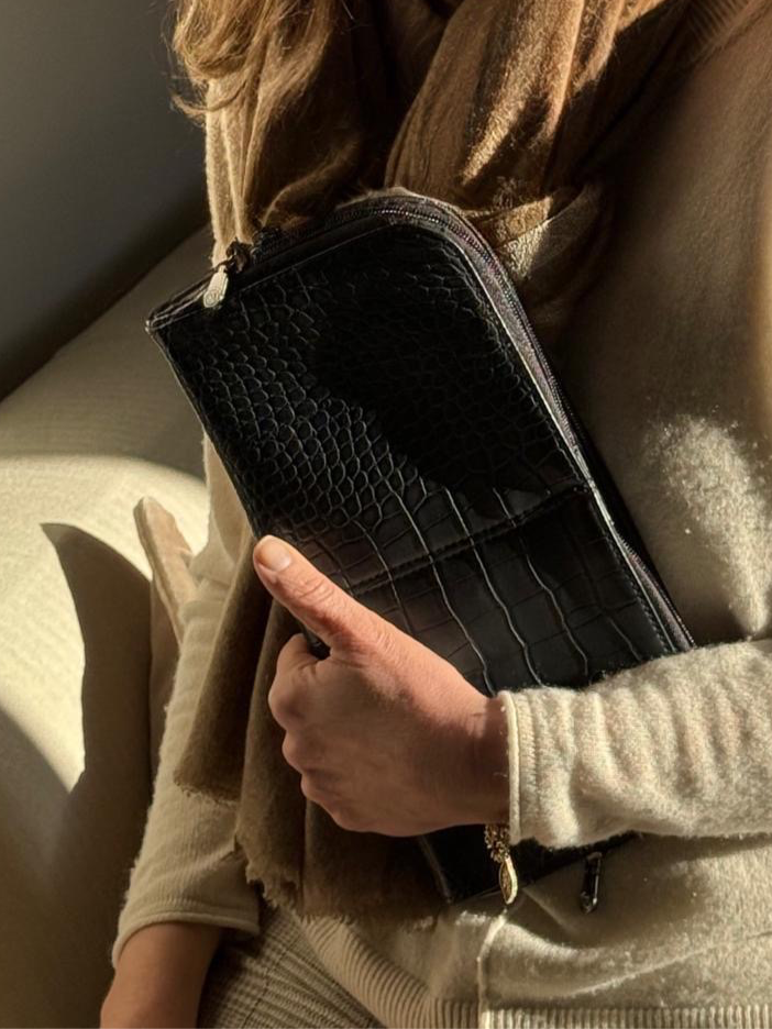 Vitale by Myriad black crocodile pattern crossbody bag lifestyle shot - vegan leather handbag with organized compartments