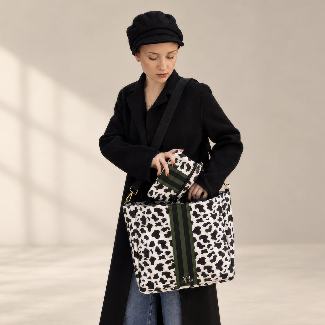Vitale by Myriad Dublin neoprene tote in cow print with a striped center panel
