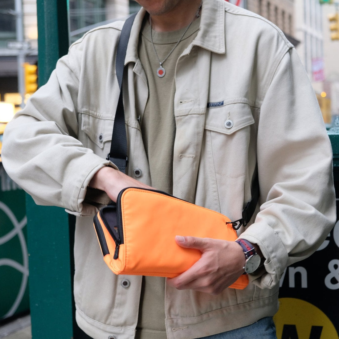 Vitale by Myriad Eros orange nylon mini crossbody with touchscreen phone pocket and organized compartments