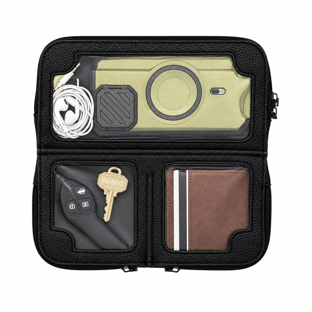 Hestia black pebble mini crossbody open flat, phone in the large bottom pocket, keys and cards in the two top compartments