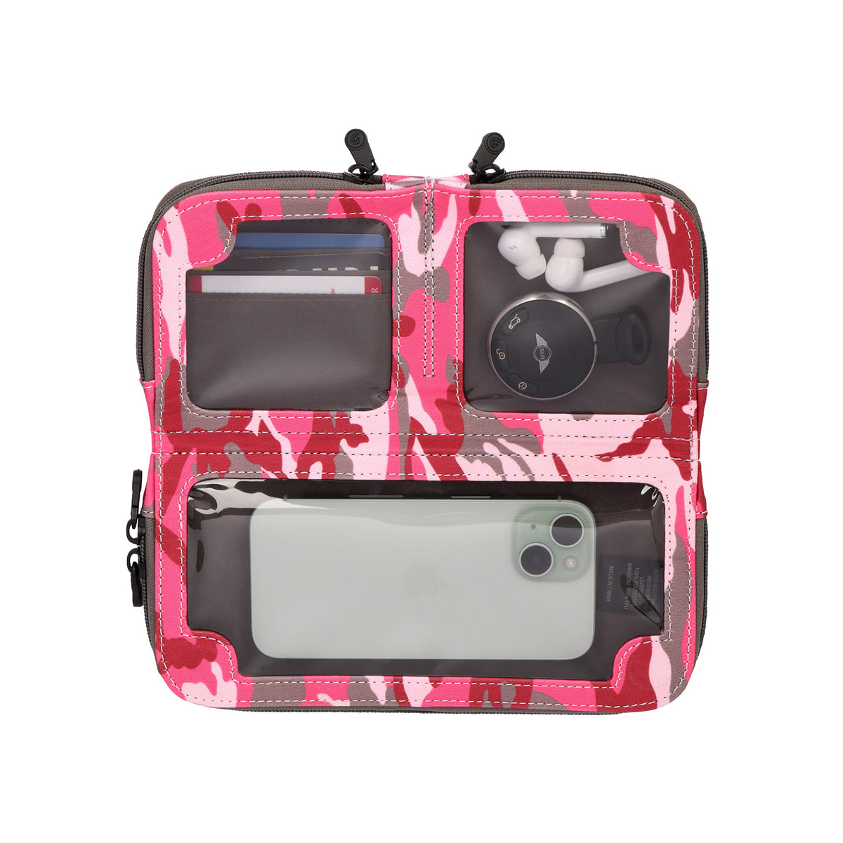 Pink camo Vitale by Myriad crossbody opened flat to show the touchscreen phone window and two lower compartments