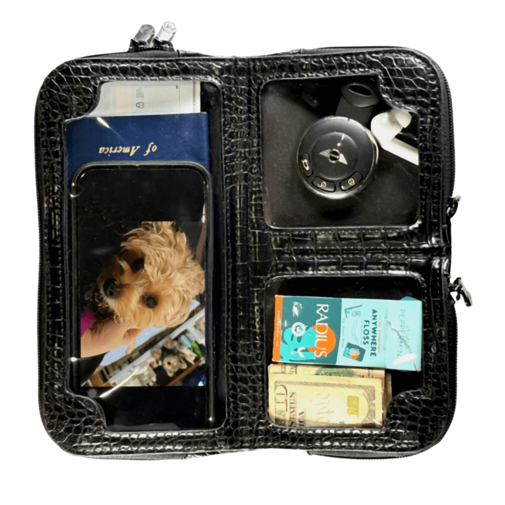 Vitale by Myriad snake print crossbody bag open showing organized compartments - vegan leather with personal items