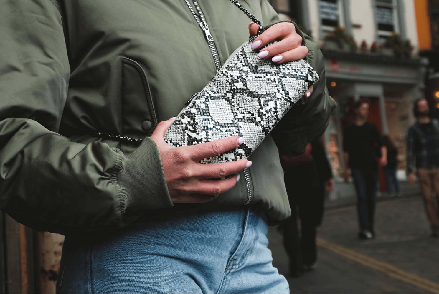 Vitale by Myriad snake print crossbody bag lifestyle shot - vegan leather handbag with compartments