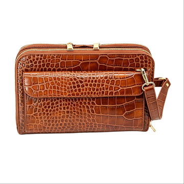 Vitale by Myriad Vallina croc-embossed crossbody in cognac, front view with flap pocket and detachable strap