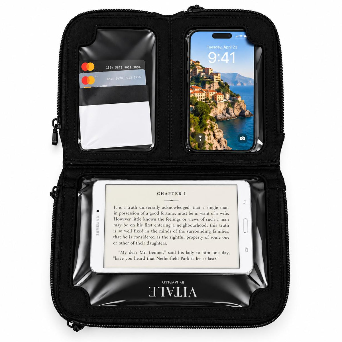 Vallina black neoprene crossbody open flat with a phone, cards and a tablet showing a book page