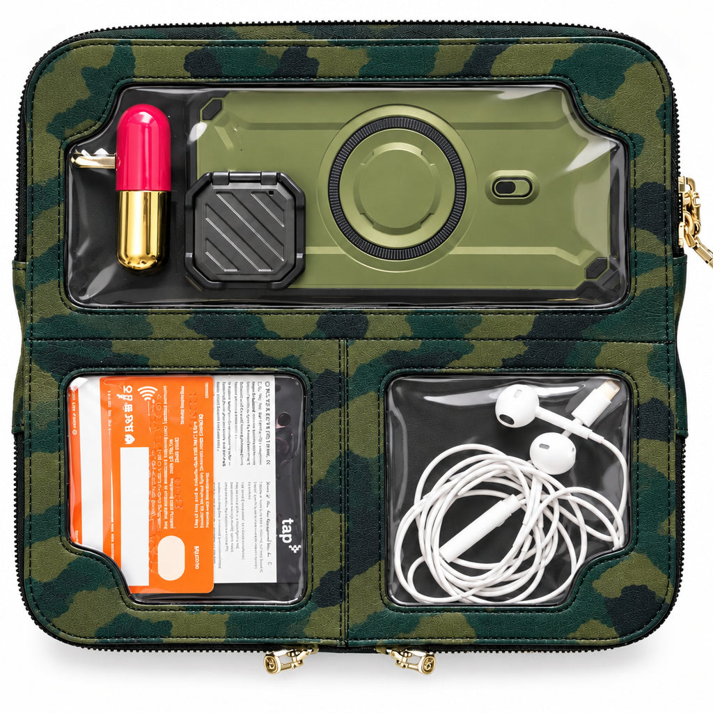 Zeloso Green Camo leather clutch open flat, phone in the touchscreen window, lip balm, cards and earbuds in its compartments